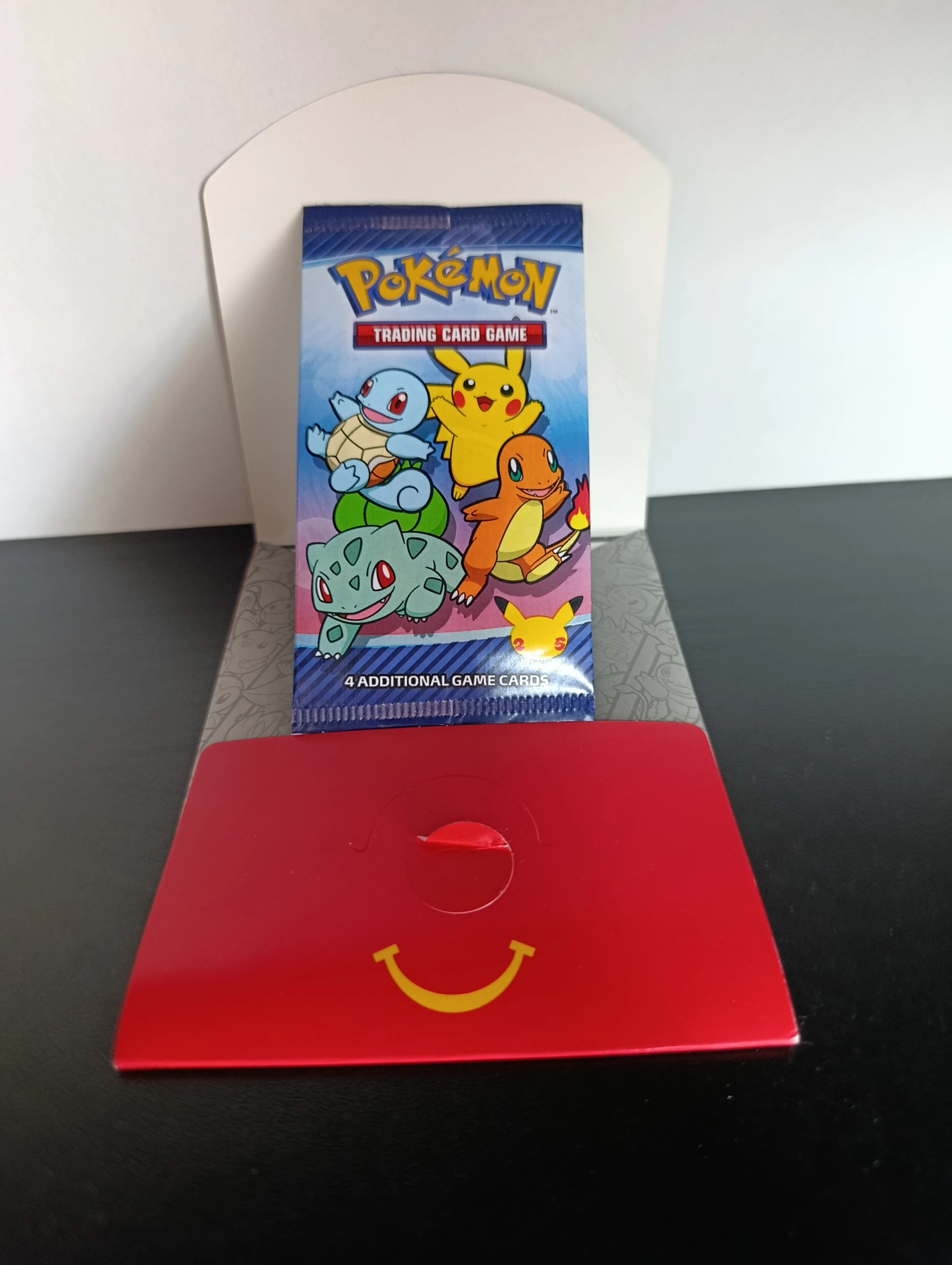 McDonald's 25th anniversary Booster Pack with original pack image 1