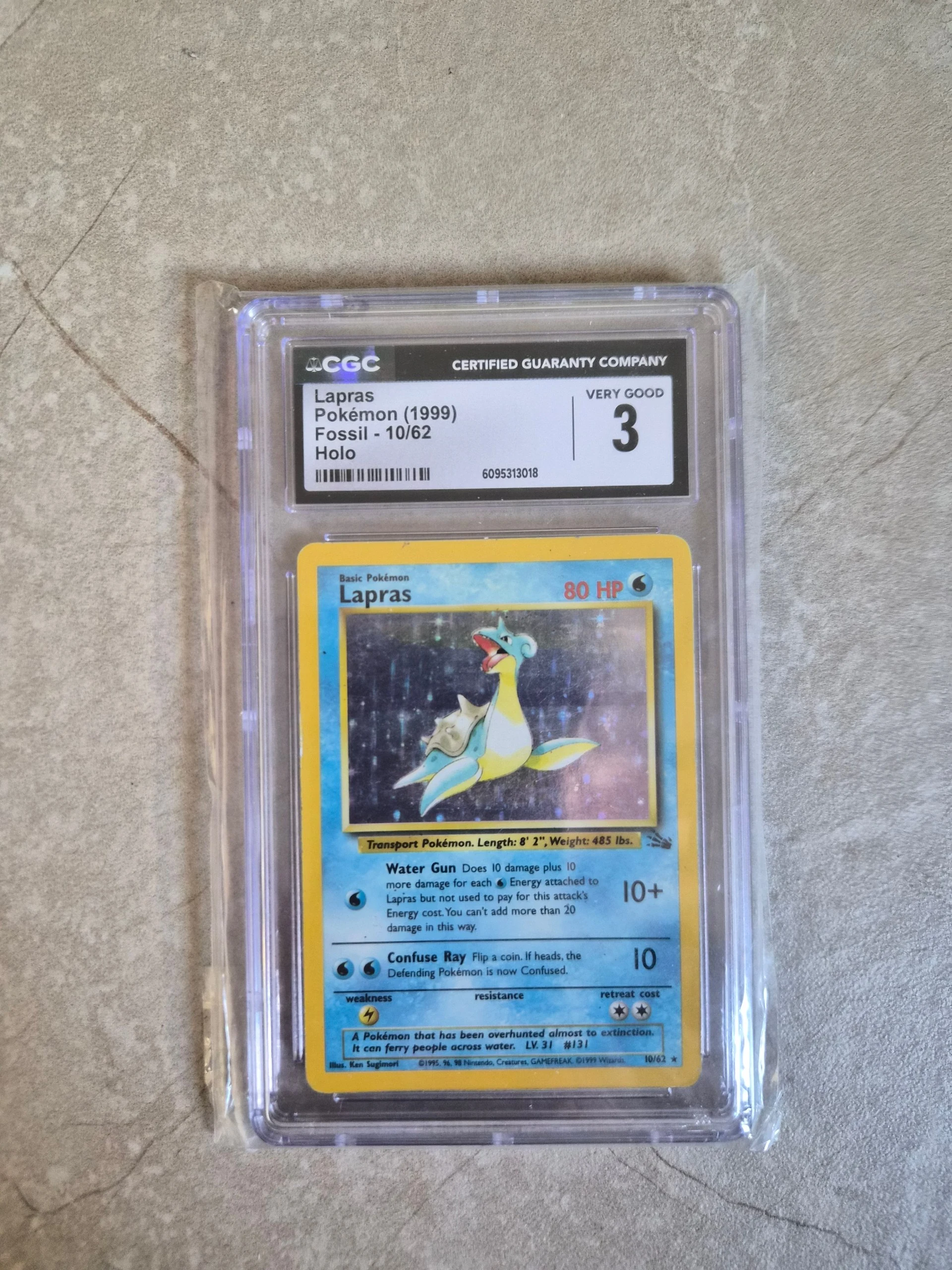 Graded card CGC Lapras 1999 fossil 10/62 holo image 1